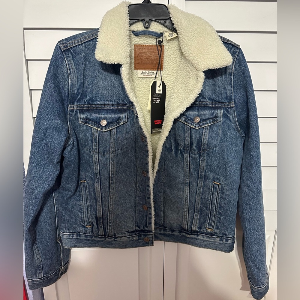 Levi’s Premium Original Trucker Jacket Brand New! 
Never Worn! 
Size Medium